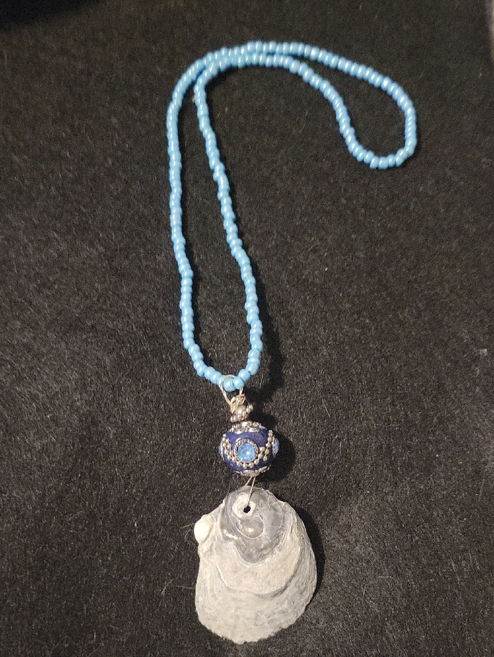 Source Unknown Light Blue Beaded Necklace with Blue Accent and Shell Pendant